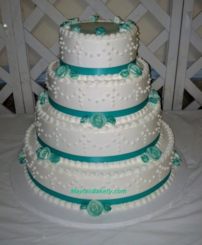 4 tier aqua green with ribbon